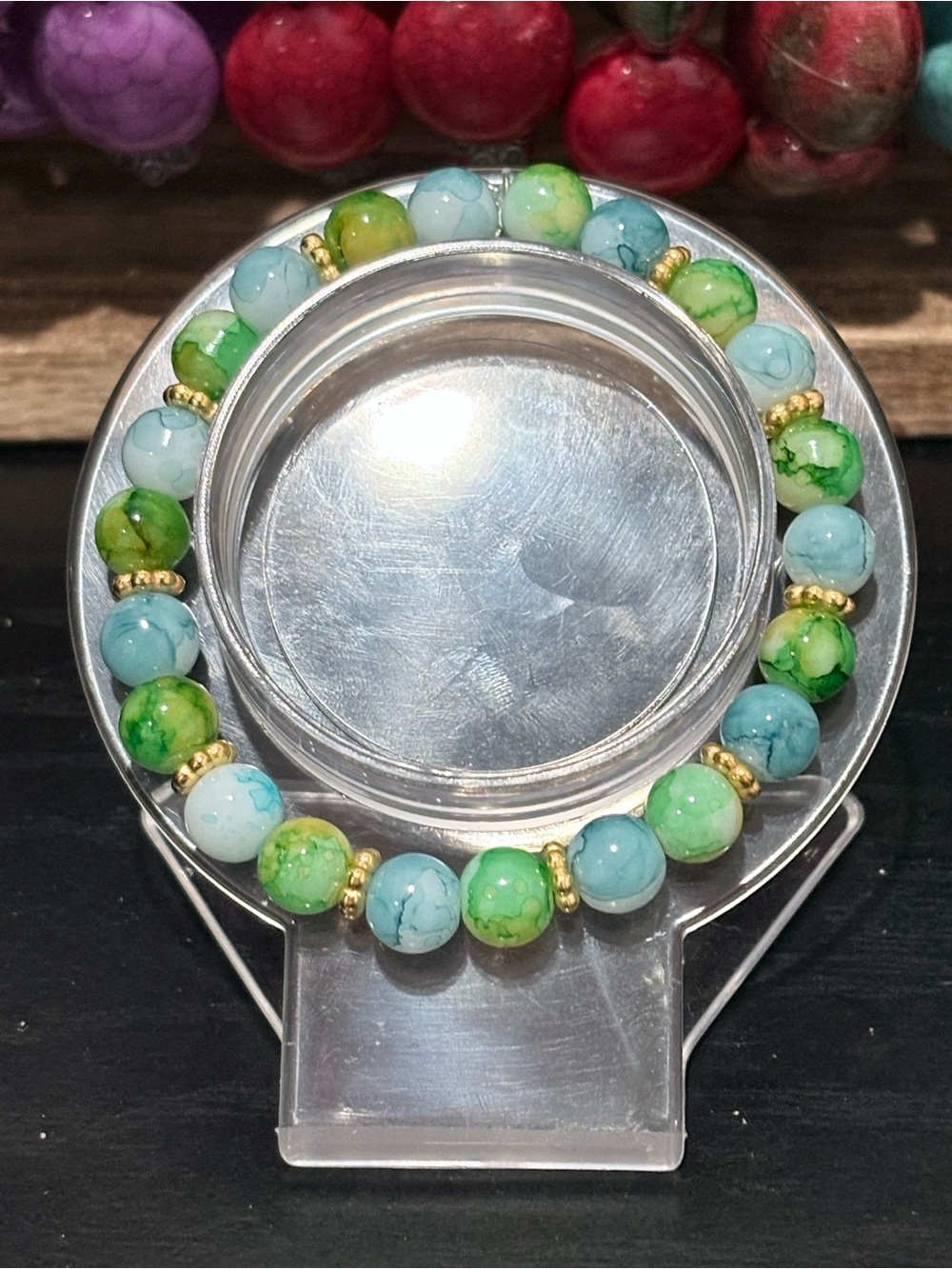 Handcrafted crackle color blue and green glass bead with gold spacer beaded brac